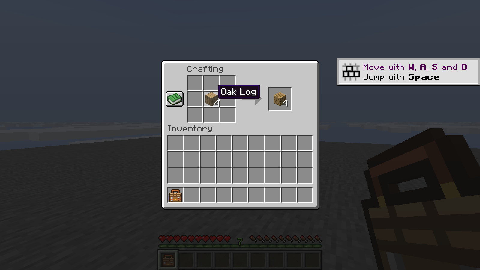 Holding the Pocket Crafting Table in game